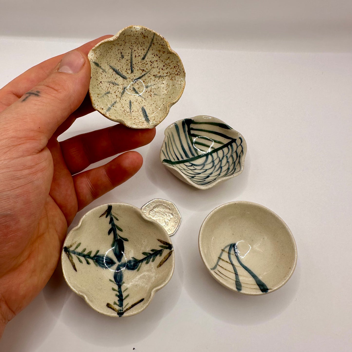 Quartet of small Decorated Bowls