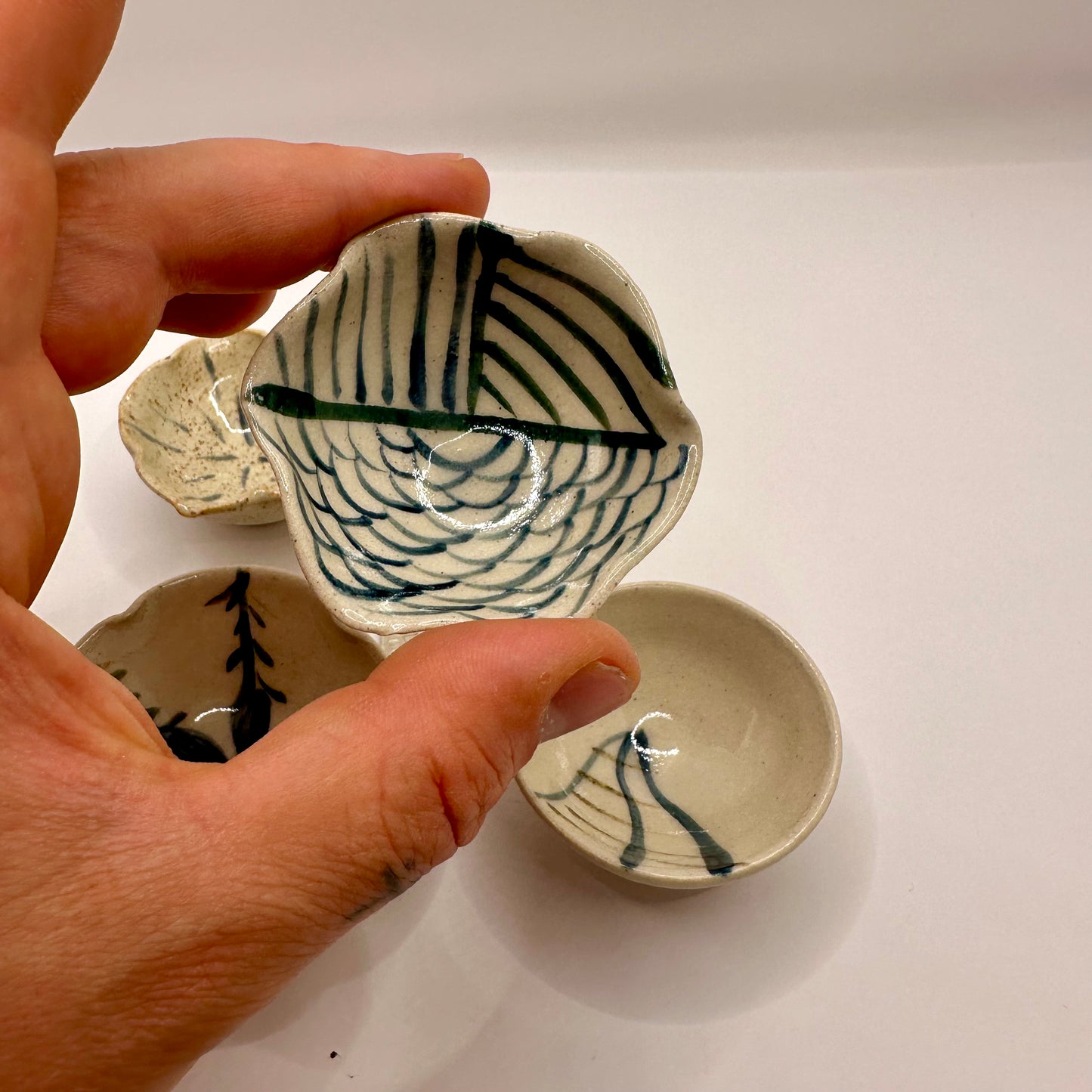 Quartet of small Decorated Bowls