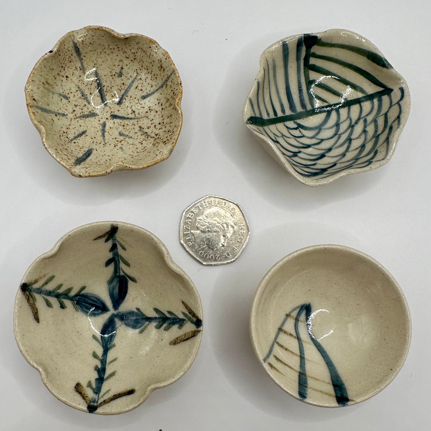 Quartet of small Decorated Bowls