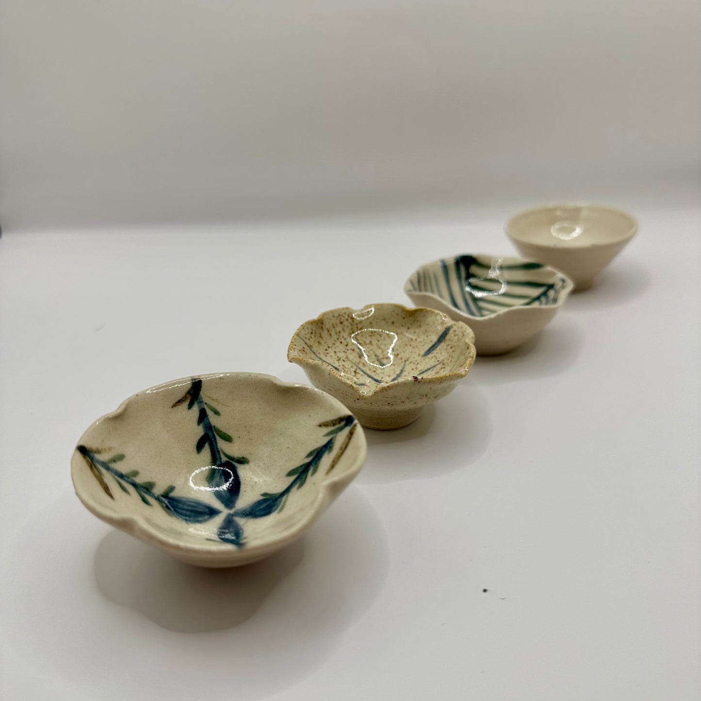 Quartet of small Decorated Bowls